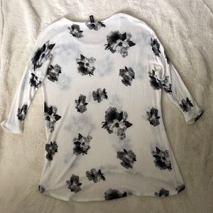 White sweater with gray and black floral